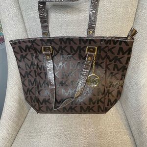 Brand new with plastic MK bag never used!